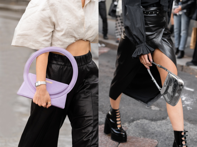 Two women wearing black leather pants, carrying a purple and a silver hand purses.