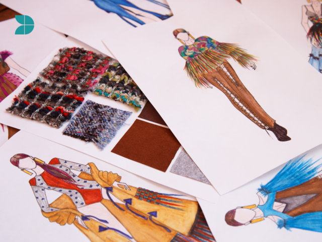 Several fashion design sketches in a table